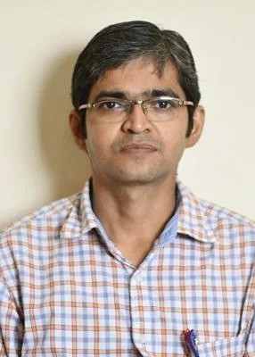 Dr. Debasish De